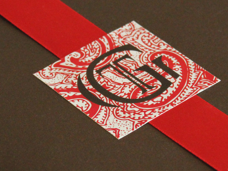 pocket-invitation-with-custom-monogram-and-ribbon